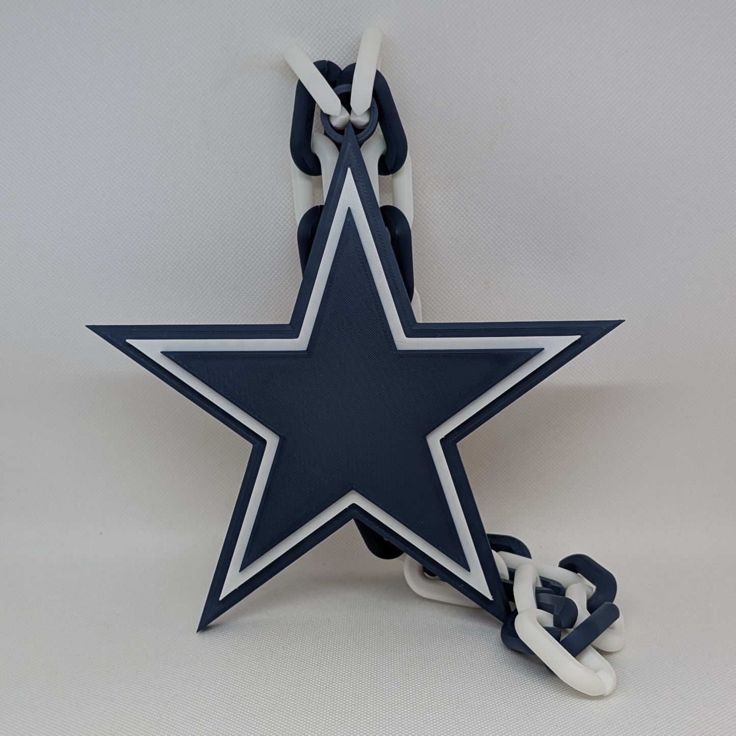 Blue star with white outline on a white background