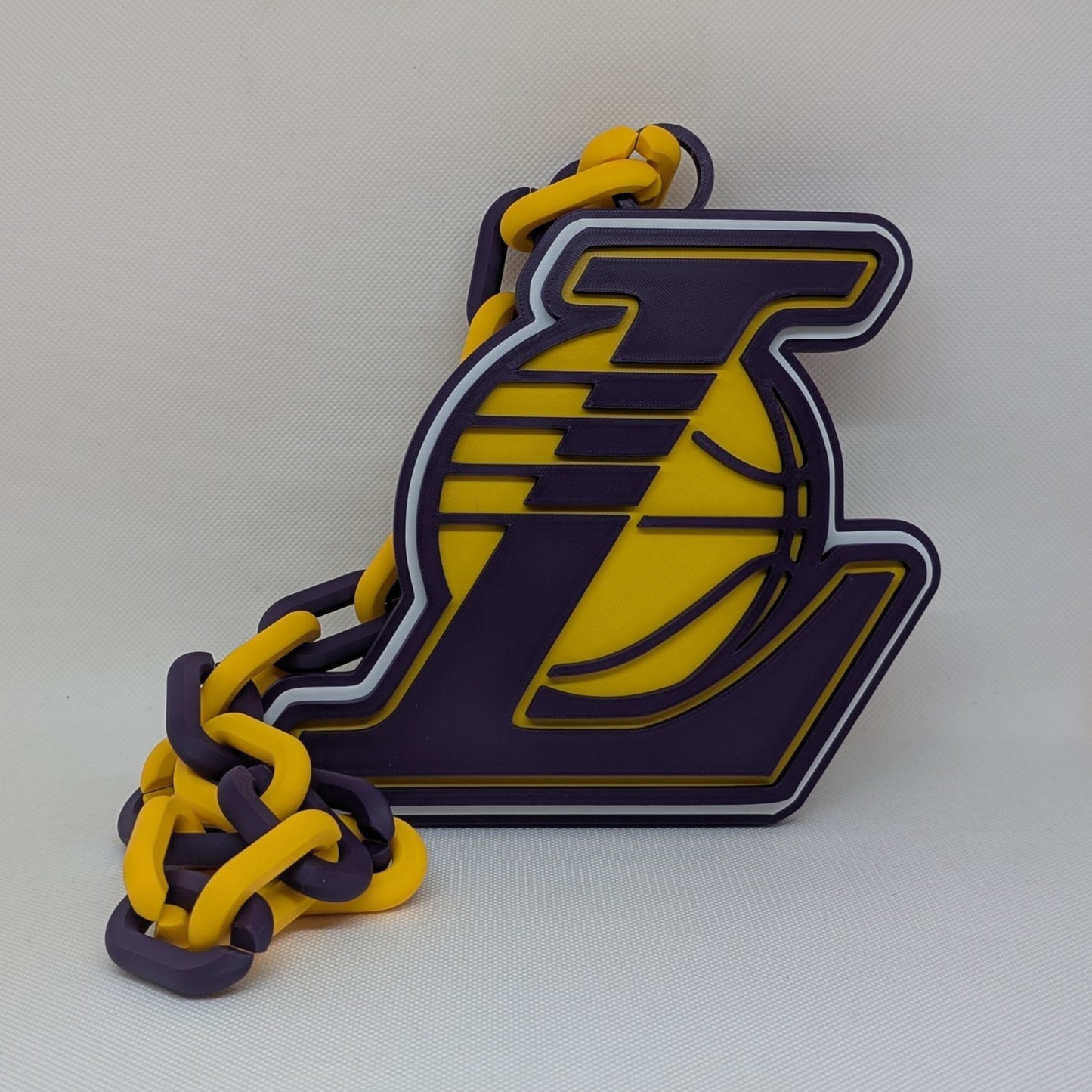 Lakers Logo with a yellow and blue design on a white background