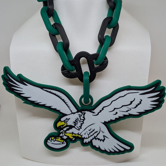 Necklace with an eagle pendant on a mannequin bust against a white background