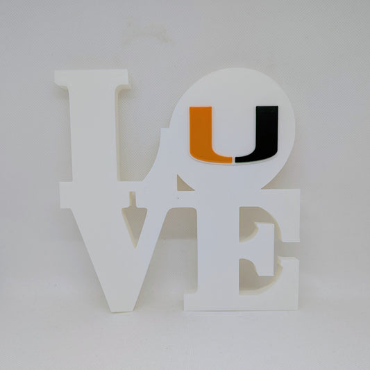 University of Miami Decorative letter 'U' with orange and black accents on a white background