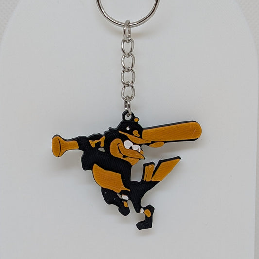 Keychain with Orioles Bird character holding a bat on a white stand