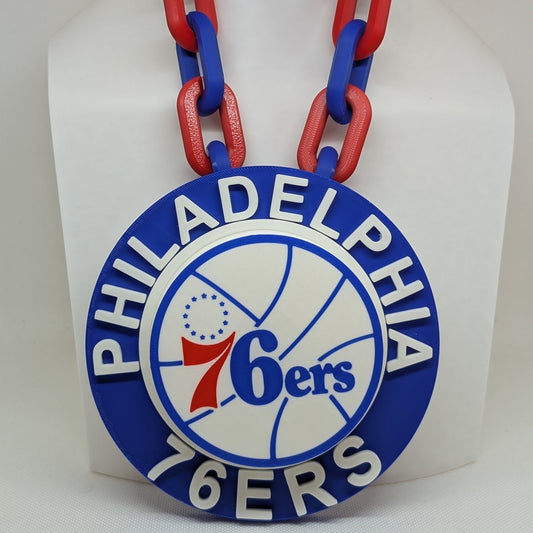 Necklace with Philadelphia 76ers logo on a white background