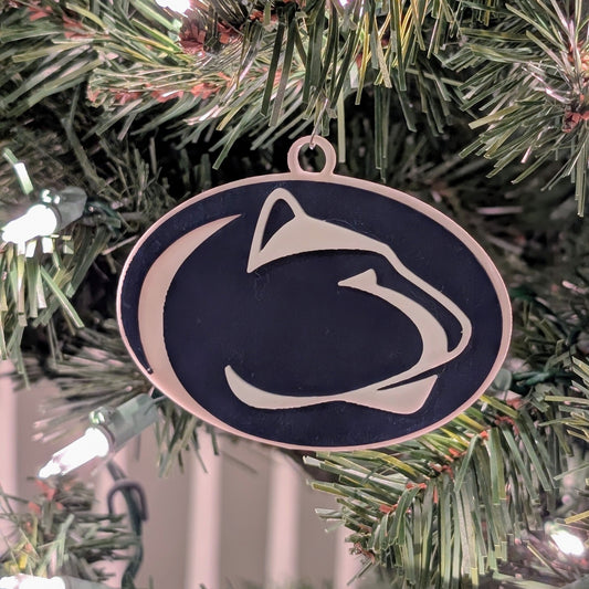 Penn State logo ornament on a Christmas tree PSU