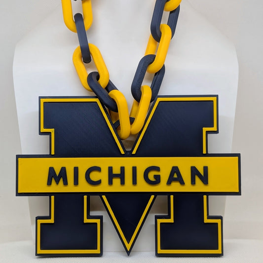 Michigan Wolverines chain necklace with 'Michigan' on a white background